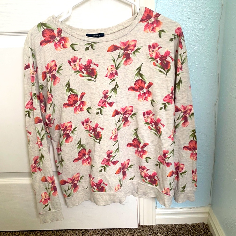 Small, lightweight, pink, green, and beige sweater.